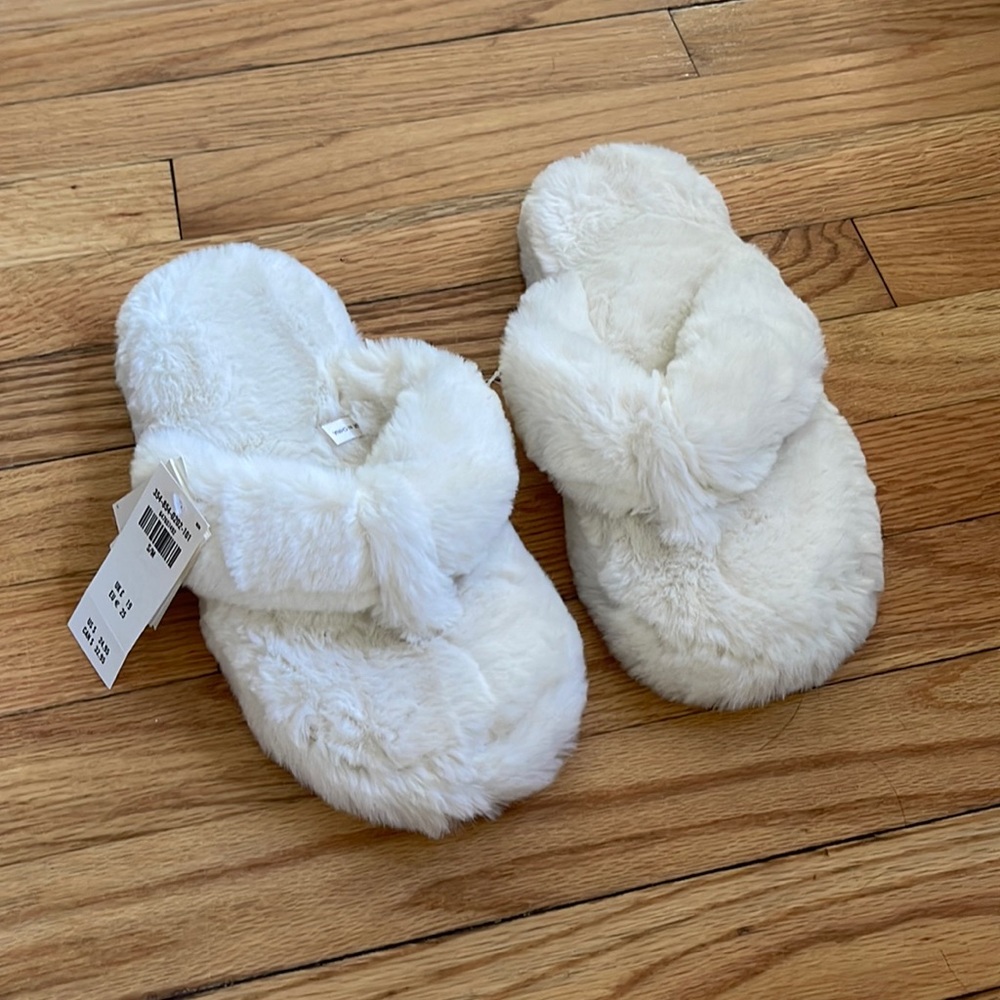 White furry slippers